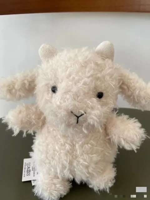 Curled goat