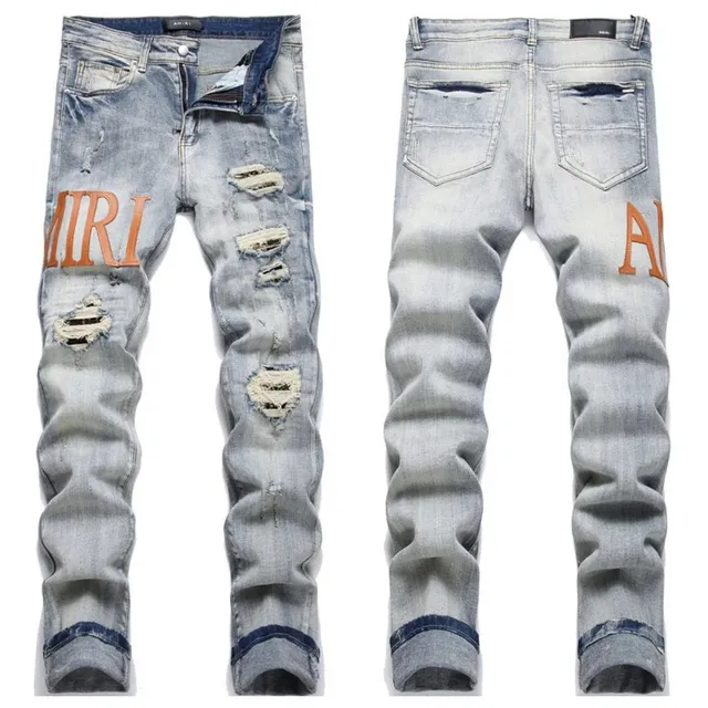 Amiri Distressed Slim Fit Jeans Orange Logo Patch