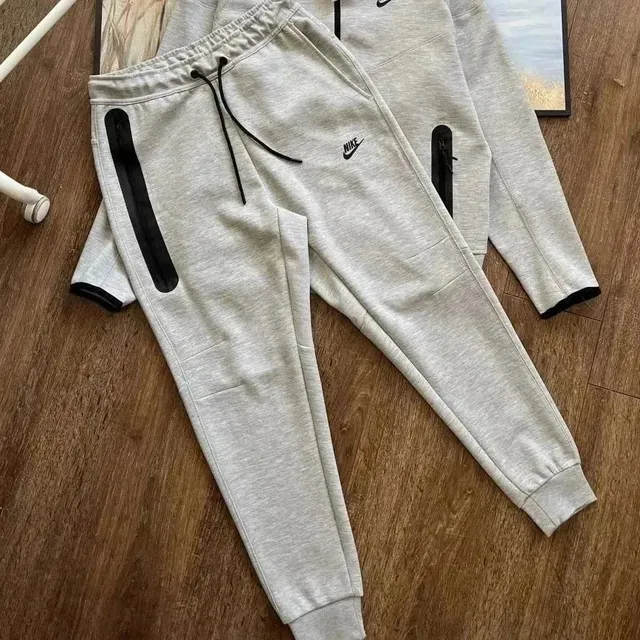 Nike Tech Fleece Joggers Light Grey with Black Zipper Detail