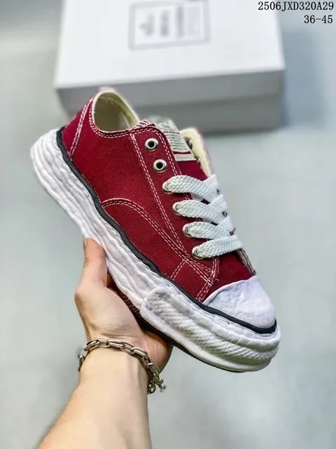 Sacai × Converse Chuck Taylor Low Double Sole