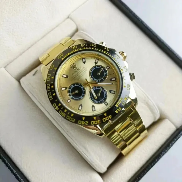 Rolex Daytona Gold Case with Black Bezel and Blue Subdials