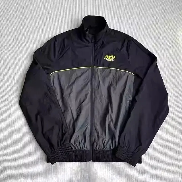 Syna World Windbreaker Jacket Black Grey Panel with Yellow Logo