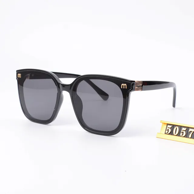 Miu Miu Sunglasses Gold Logo Detail