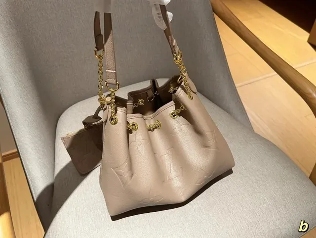 Louis Vuitton On The Go Bucket Embossed Monogram