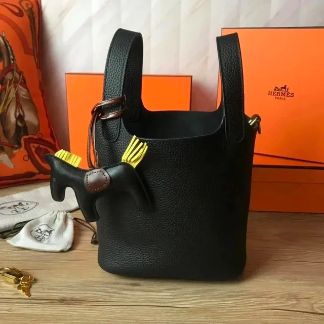 Hermès Picotin Lock Black Taurillon Leather with Yellow Horse Charm
