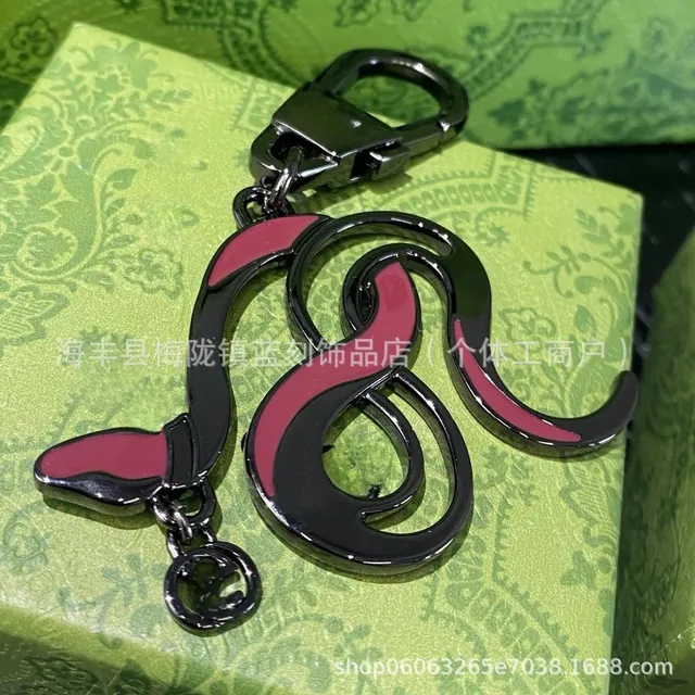 Gucci Serpenti Keychain Black and Pink Enamel