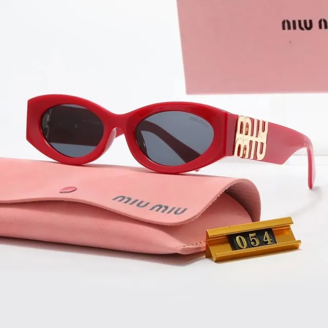 Miu Miu Oval Sunglasses Gold Logo Temple