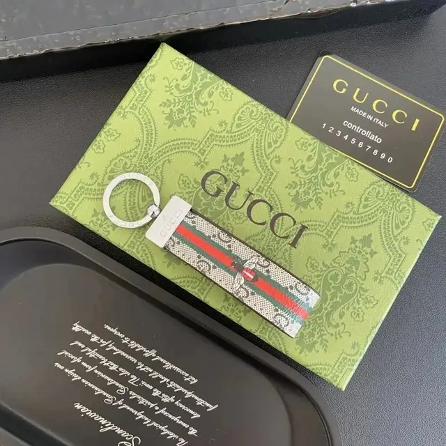 Gucci Webbing Keychain GG Supreme Webbing