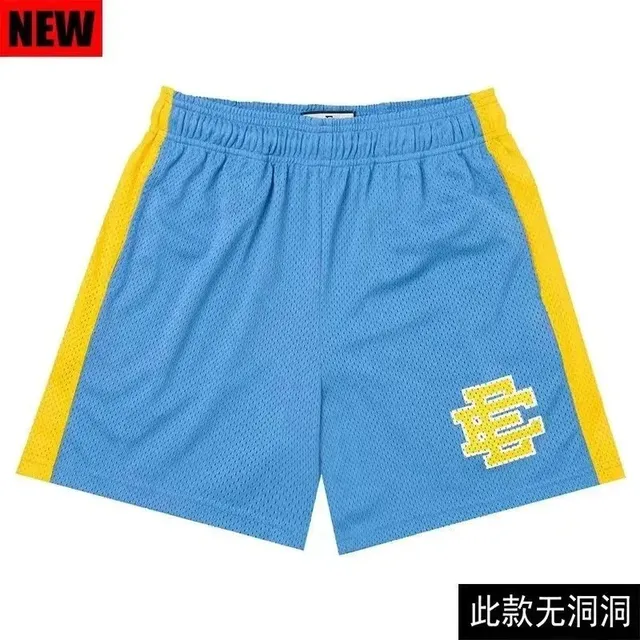 Fear of God Essentials Mesh Shorts Blue with Yellow Side Stripes