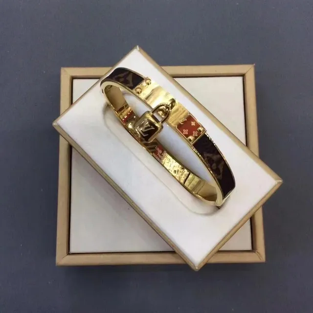 Louis Vuitton Lock It Bangle Monogram Canvas with Red Enamel