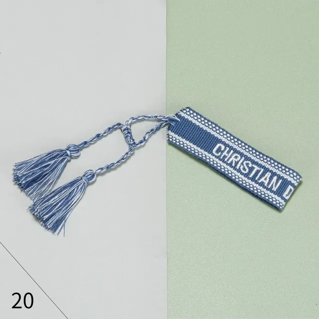Dior Logo Tassel Tag Navy and White Woven