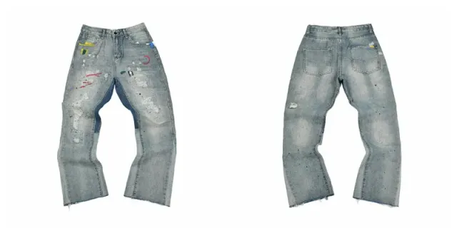 Denim Tears Paint Splatter Jeans Distressed with Multi-Color Paint Accents