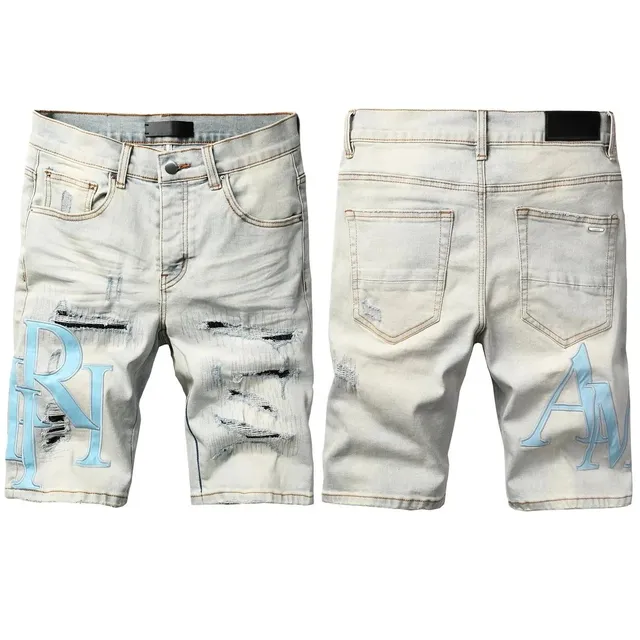 Amiri Distressed Denim Shorts