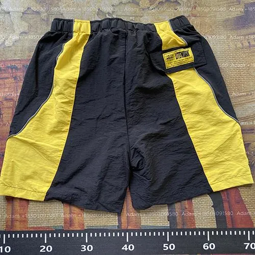 Corteiz Track Shorts Black Yellow Panel