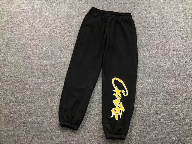 Corteiz Joggers Yellow Script Logo