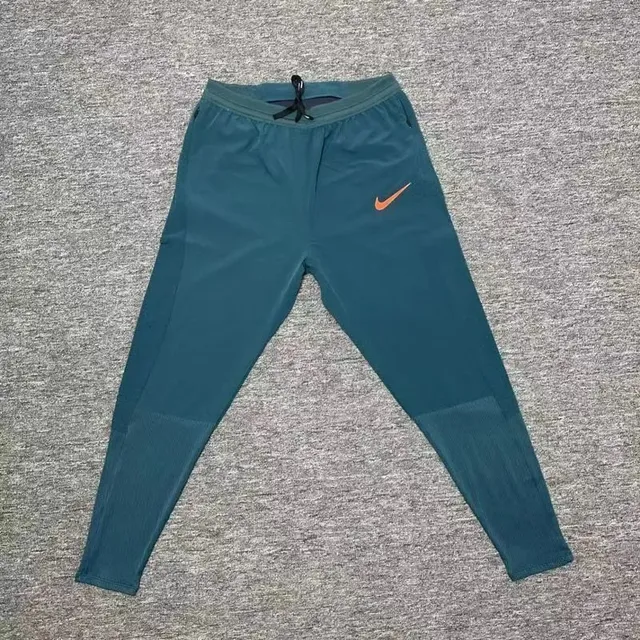 Nike Tech Fleece Joggers Navy with Orange Swoosh