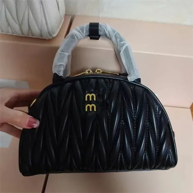 Miu Miu Matelassé Dome Bag Quilted Leather