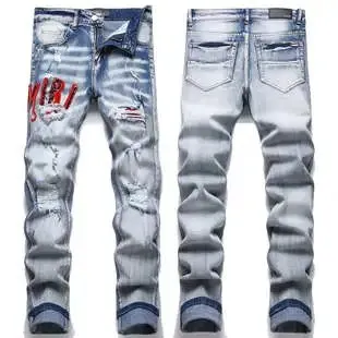 Amiri Distressed Jeans Graffiti Print
