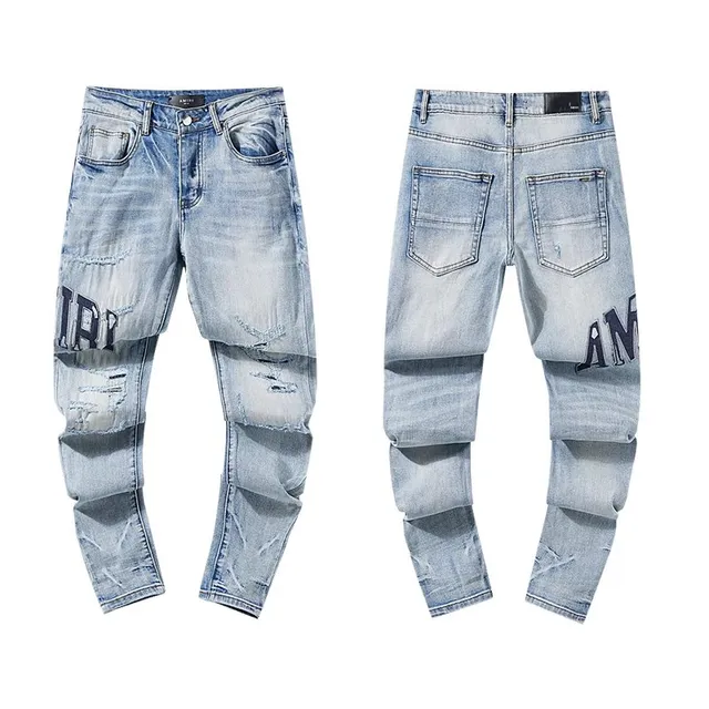 Amiri Distressed Logo Jeans Light Wash with Embroidered Logo