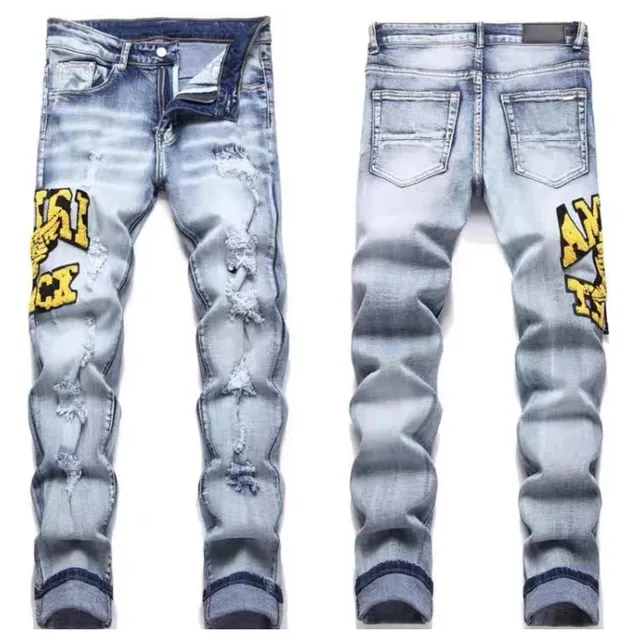Amiri Distressed Slim Fit Jeans Yellow Logo Patch