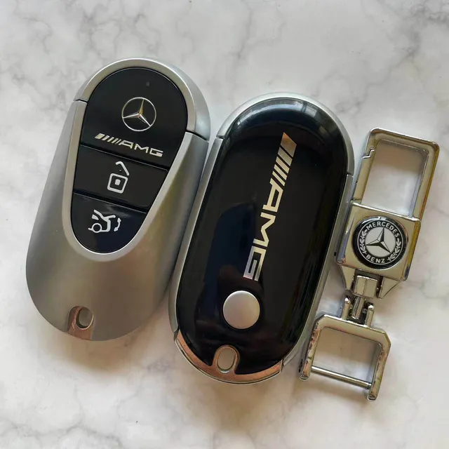 4 AMG keychains with circuit board and open teeth for key delivery