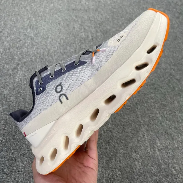 On Cloudmonster Navy Orange