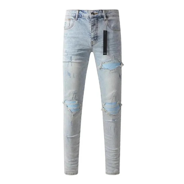 Amiri Distressed Skinny Jeans Light Wash with Ribbed Knee Patches