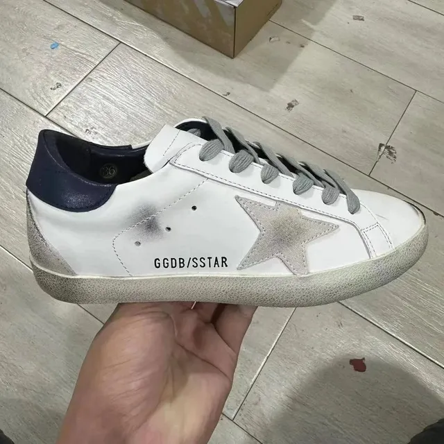 Golden Goose Superstar Distressed White with Navy Heel