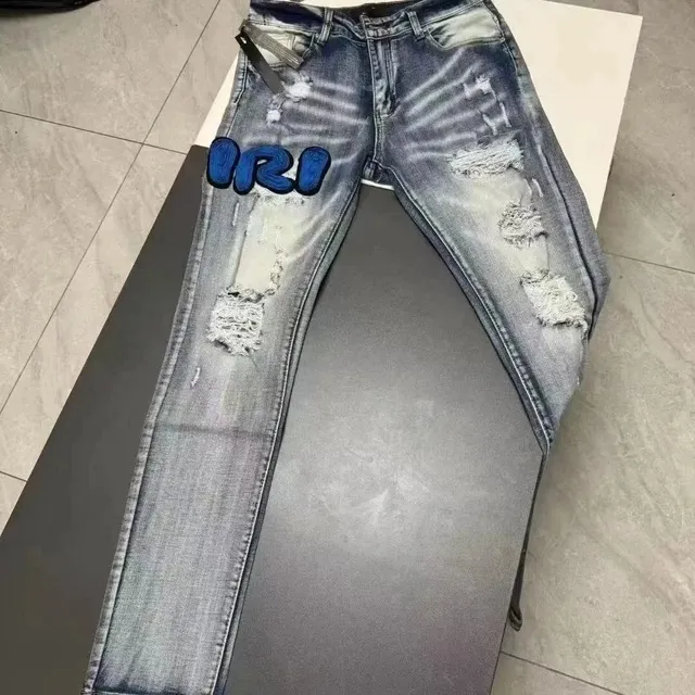 Amiri Distressed Jeans Blue IRI Patch