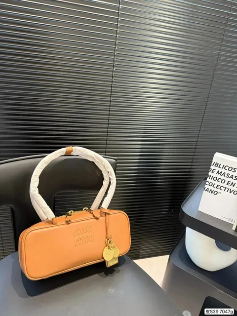 Miu Miu Matelassé Bag Tan Leather with Embossed Logo
