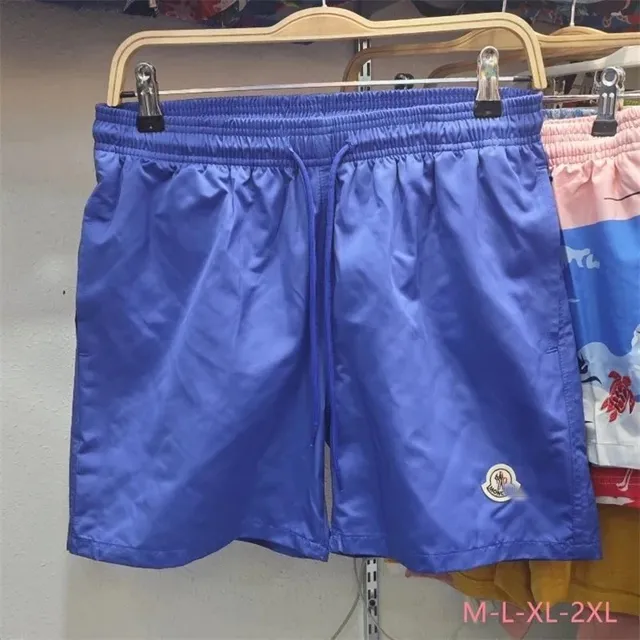 Moncler Logo-Embroidered Shorts Solid Blue