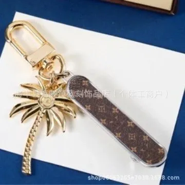Louis Vuitton Palm Tree Keychain Monogram Canvas with Gold Hardware
