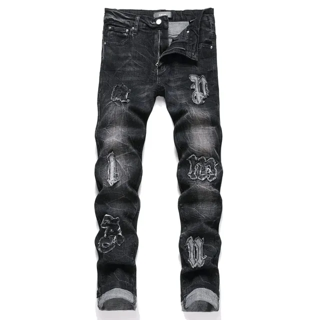 Amiri Distressed Denim Jeans Gothic Logo Patch