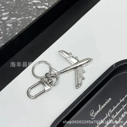 Louis Vuitton Airplane Keychain Metallic