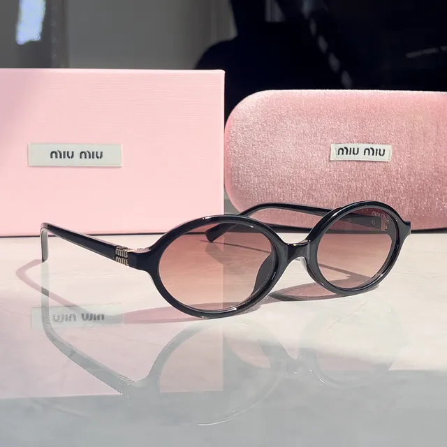 Miu Miu Oval Sunglasses Black Frame with Gradient Pink Lenses