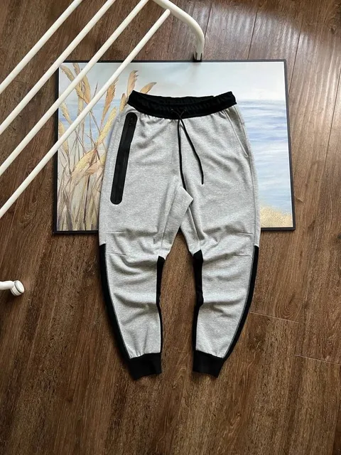 Black and light gray sweatpants
