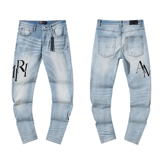 Amiri Logo Jeans Distressed Light Wash