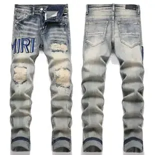 Amiri Distressed Jeans MIRI Logo Patchwork