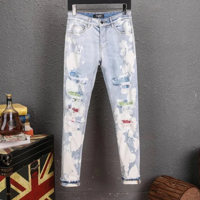 Amiri Distressed Jeans Bleach-Splatter with Patchwork Rips