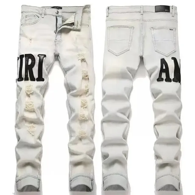Amiri Distressed Logo Jeans White with Black Lettering