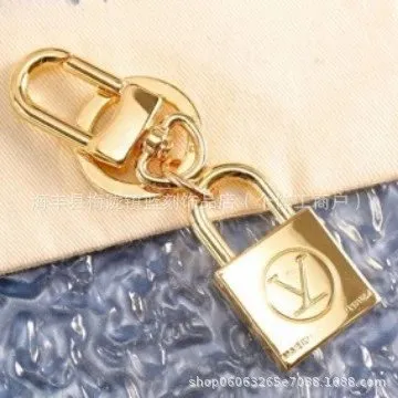 Louis Vuitton Padlock Keychain Gold-tone LV Logo