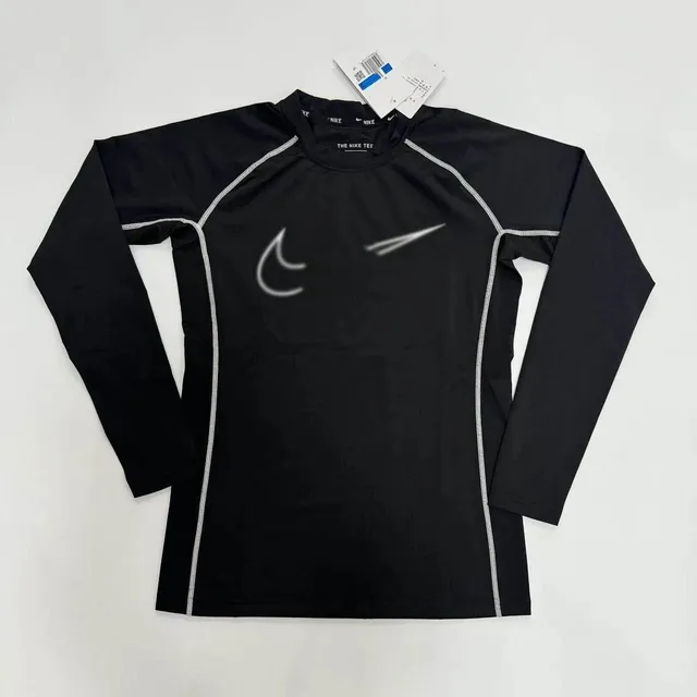 The Nike Tee Black with Reflective Swoosh