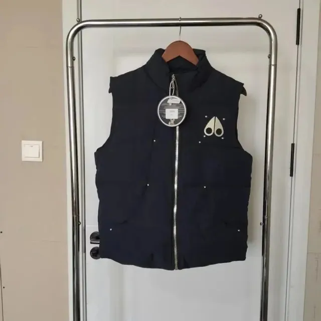 Puffer Vest Scissors Logo