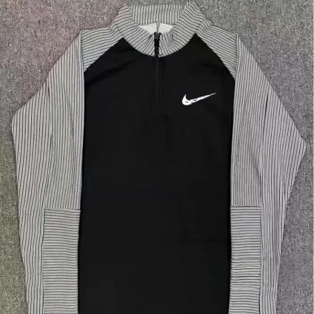 Nike Tech Fleece Half-Zip Striped Sleeve