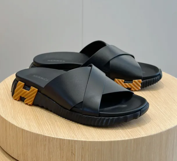 Hermès Oran Sandal Black with Orange H Logo