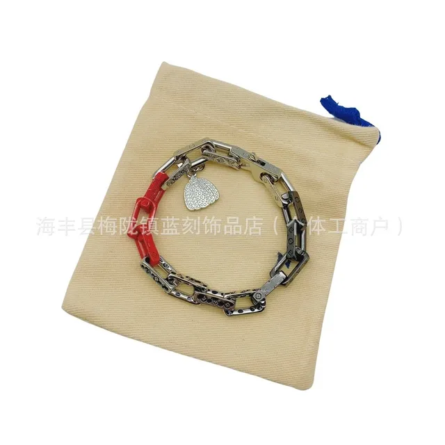 Louis Vuitton Chain Bracelet Monogram Link with Red Resin