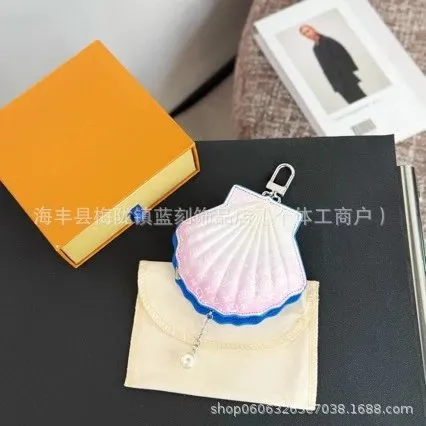粉色贝壳珍珠迷你包