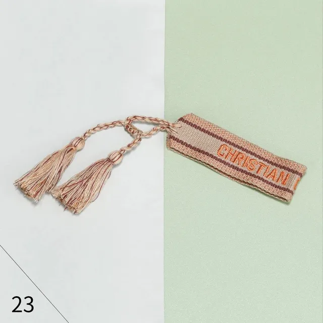 Dior Logo Tag Woven Strap with Tassels