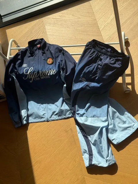 Umbro Track Suit Supreme Cha mpions