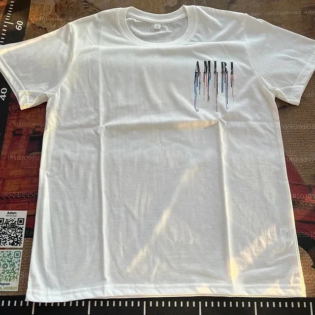 Amiri Graphic Tee Dripping Logo